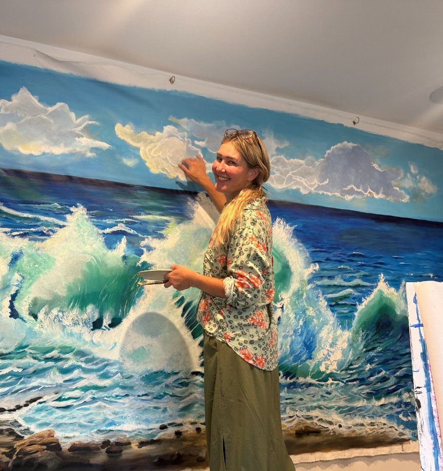 Defne Altug painting in her studio
