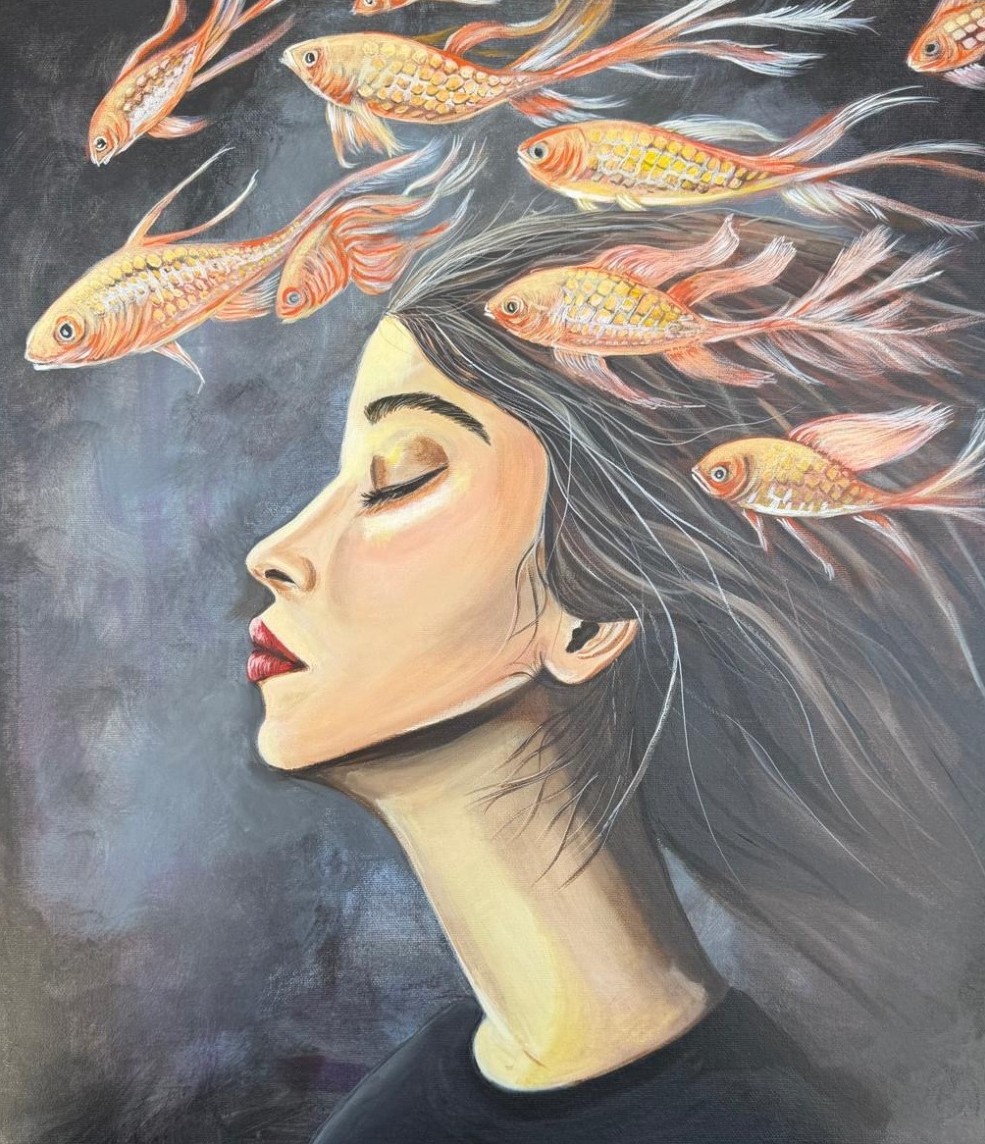A sleeping woman with a shoal of goldfish streaming from her hair